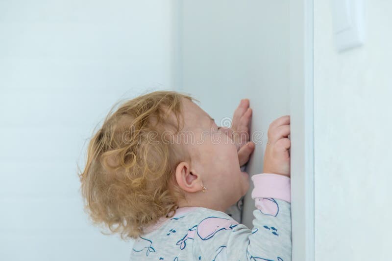 Baby Cries Closed the Door. Selective Focus Stock Photo Image of hand