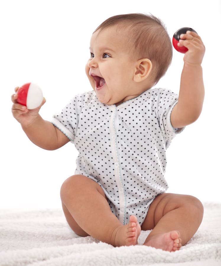Baby, das mit Kugeln spielt. stockbilder Baby, das mit Kugeln spielt. stockbilder