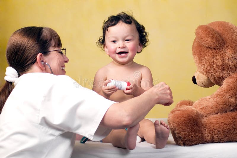 Baby with doctor.