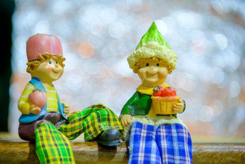 Baby Doll with Abstract Circular Bokeh Background. Stock Photo Image