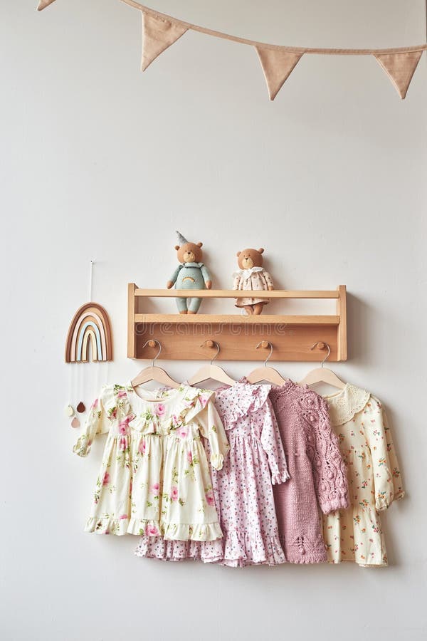 Baby Dresses on Hanger. Nursery Interior Stock Photo Image of knitted