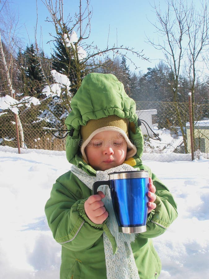 Baby drinking hot beverage stock image. Image of little 23151233