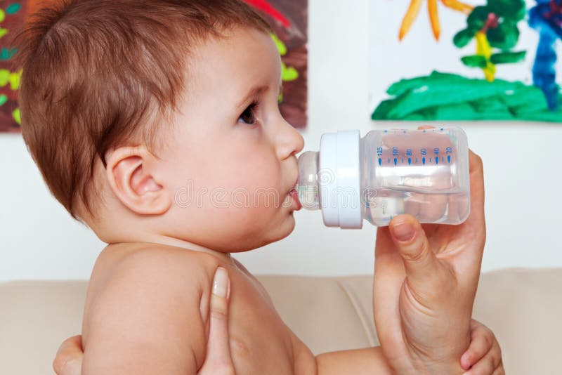 Baby Drinking Water from Bottle Stock Photo Image of boys, european
