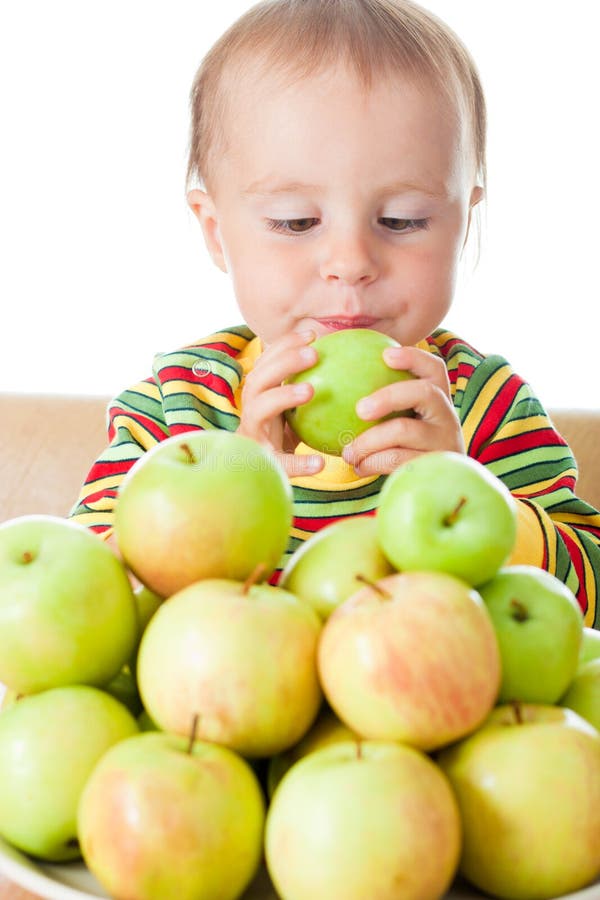 Baby eating apple stock photo. Image of cheerful, health 28595708