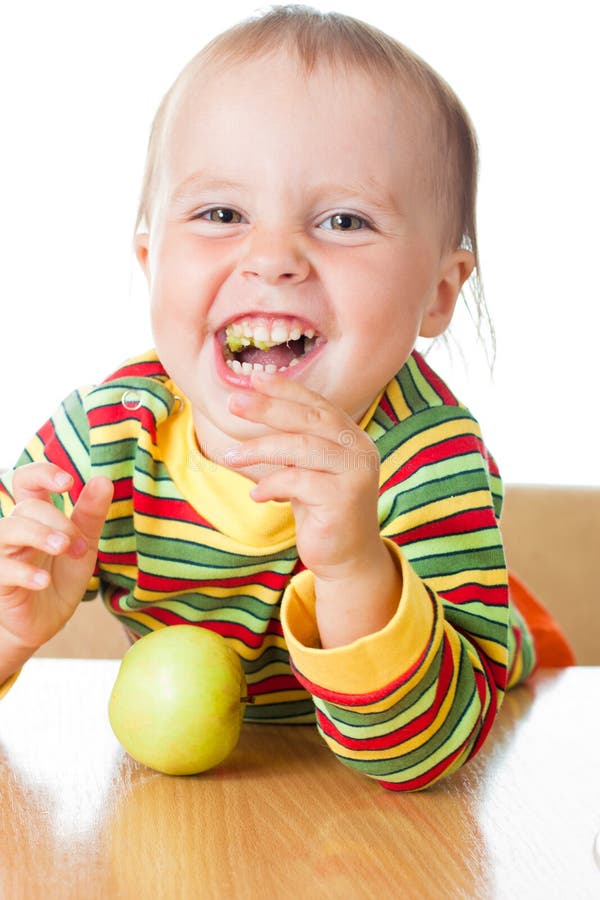 Baby eating apple stock photo. Image of fresh, cheerful 28595846