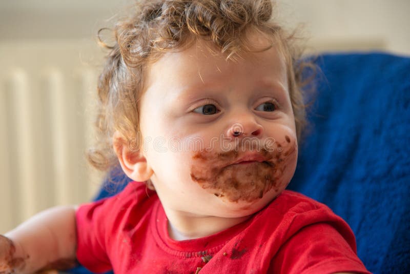 Baby is Eating a Chocolate Cake Stock Photo Image of caucasian