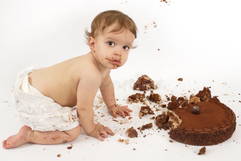 Baby eating chocolate cake stock image. Image of eating 15057777