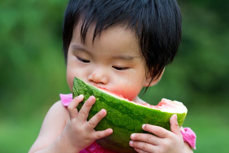 Baby eating watermelon stock photo. Image of children 24020566