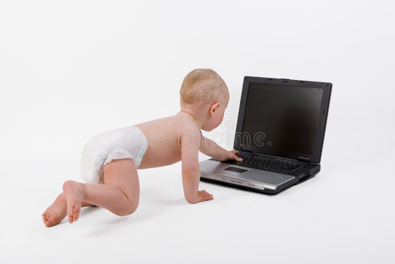 Baby en computer stock foto Baby en computer stock foto