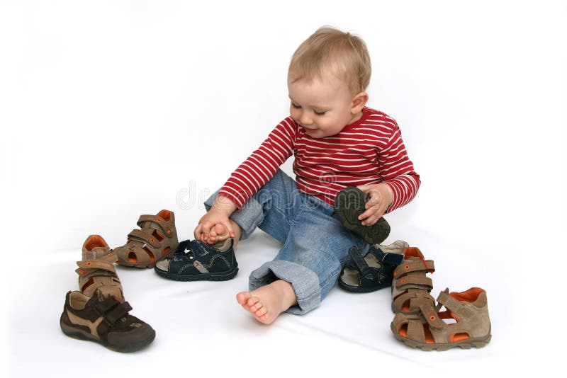Baby en schoenen royalty-vrije stock fotografie Baby en schoenen royalty-vrije stock fotografie