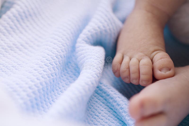 Baby feet stock image. Image of blanket, girl, wrap, sleep 5199229