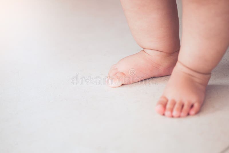 Baby Feet Doing the First Step on the Floor Stock Photo Image of