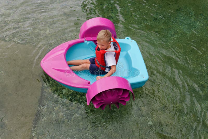 Baby Floats on a Toy Baby Boat. Attraction Stock Photo Image of