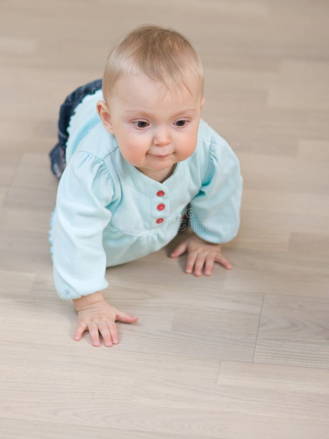 Baby on floor stock photo. Image of azure, curious, childhood 8712792
