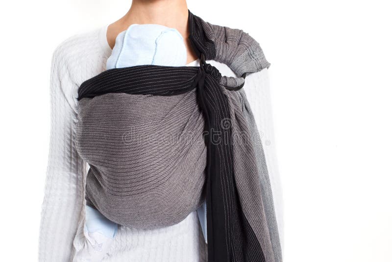 A Baby in Front Vertical Position in a Ring Sling Baby Carrier Stock