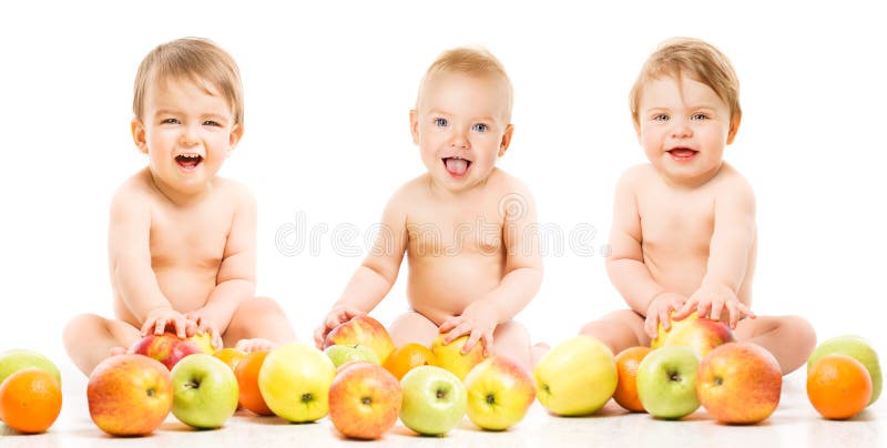 Baby-Frucht für Babys, glückliche Kinder mit Äpfeln, Kinder auf Weiß lizenzfreie stockfotos Baby-Frucht für Babys, glückliche Kinder mit Äpfeln, Kinder auf Weiß lizenzfreie stockfotos
