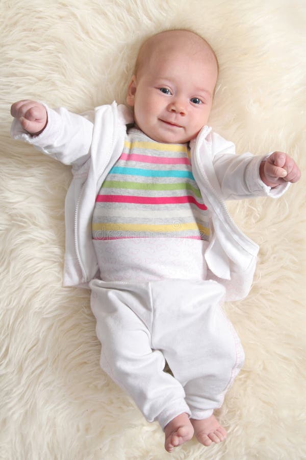 Baby girl with flowers stock photo. Image of girl, innocence - 4478810