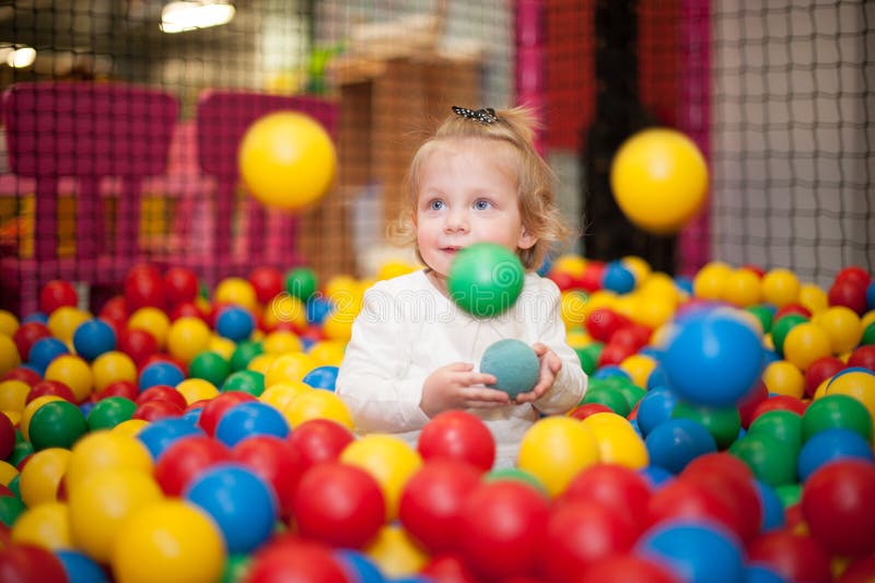 Baby girl in ball pool stock photo. Image of ideas, children 40171716