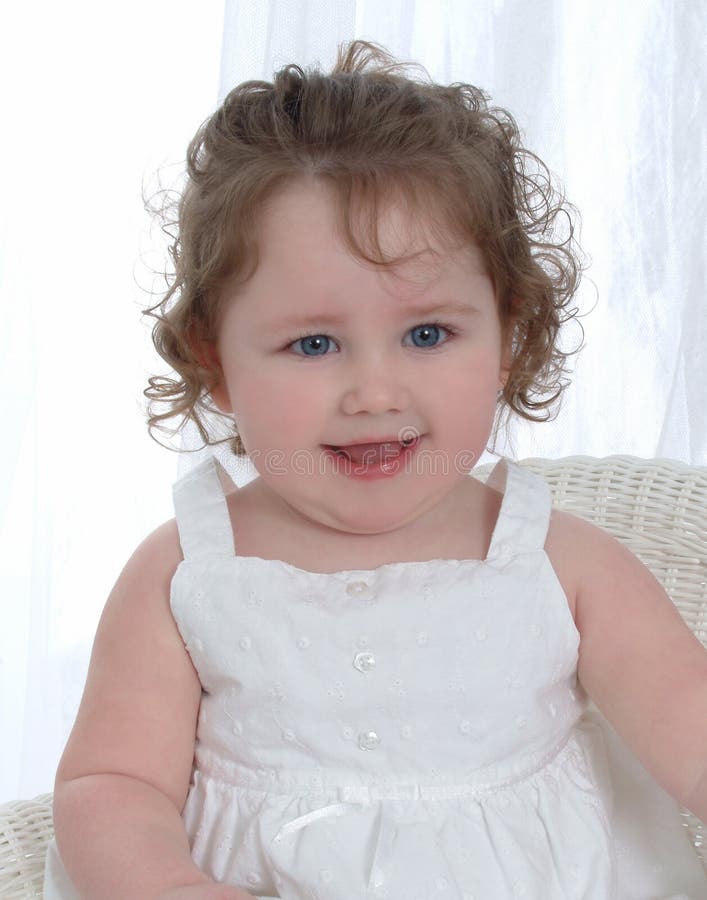 Baby Girl with Blue Eyes stock photo. Image of clothing 4749706