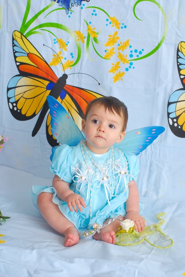 Baby girl with butterfly wings