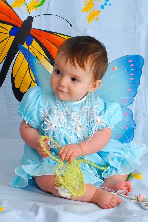 Baby girl with butterfly wings