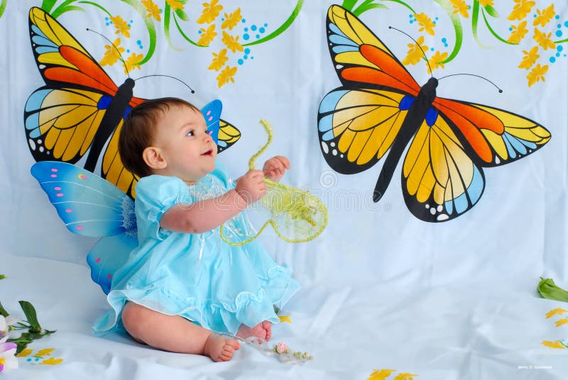 Baby girl with butterfly wings