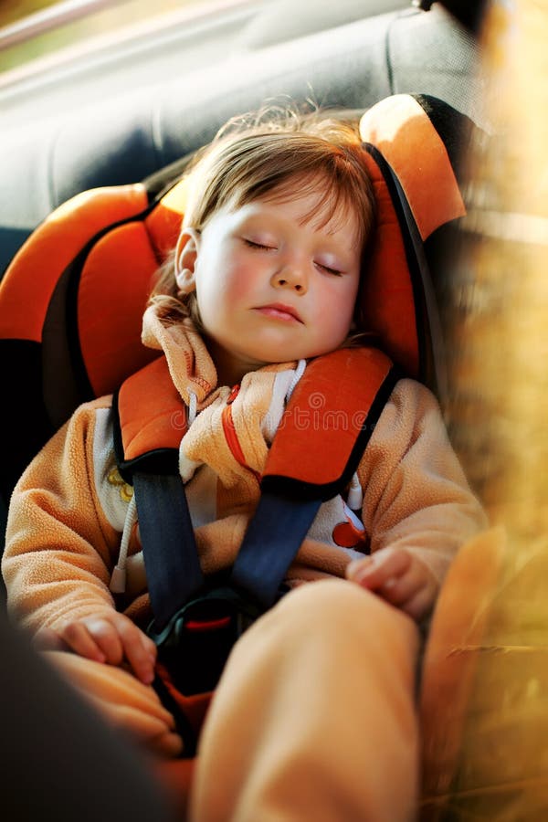 Baby girl in car stock image. Image of childhood, care 36117177