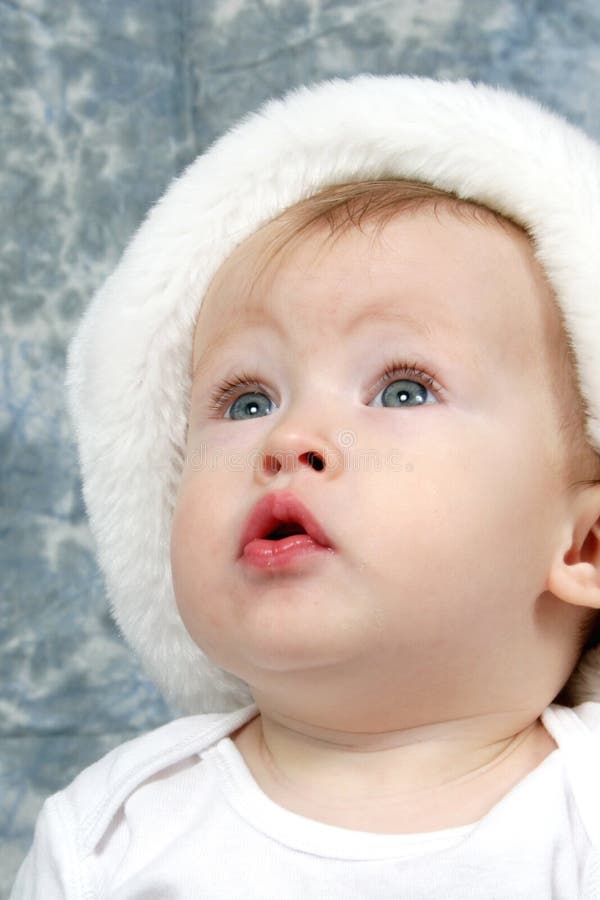 Baby Girl in Christmas Hat stock image. Image of christmas 1598533