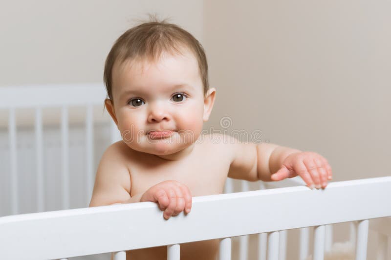 Baby Girl in a Diaper Playing in the Crib Stock Photo - Image of childhood,  face: 175733370