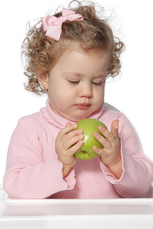 Baby girl eating fruit stock image. Image of food, happiness 28235253
