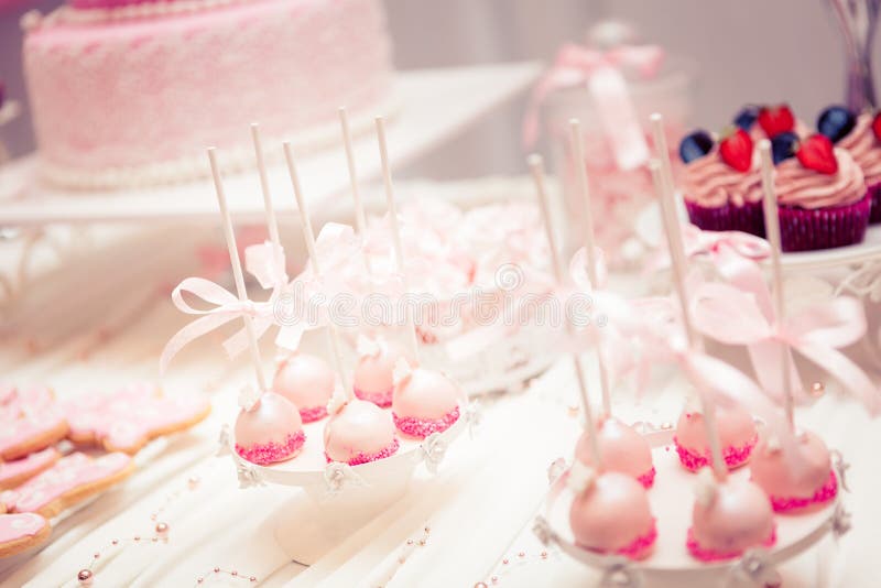 Baby girl first birthday party - stylish table set stock photos Baby girl first birthday party - stylish table set stock photos