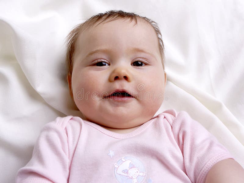 Baby Girl Looks into the Camera Stock Photo Image of pink, learning 43171094