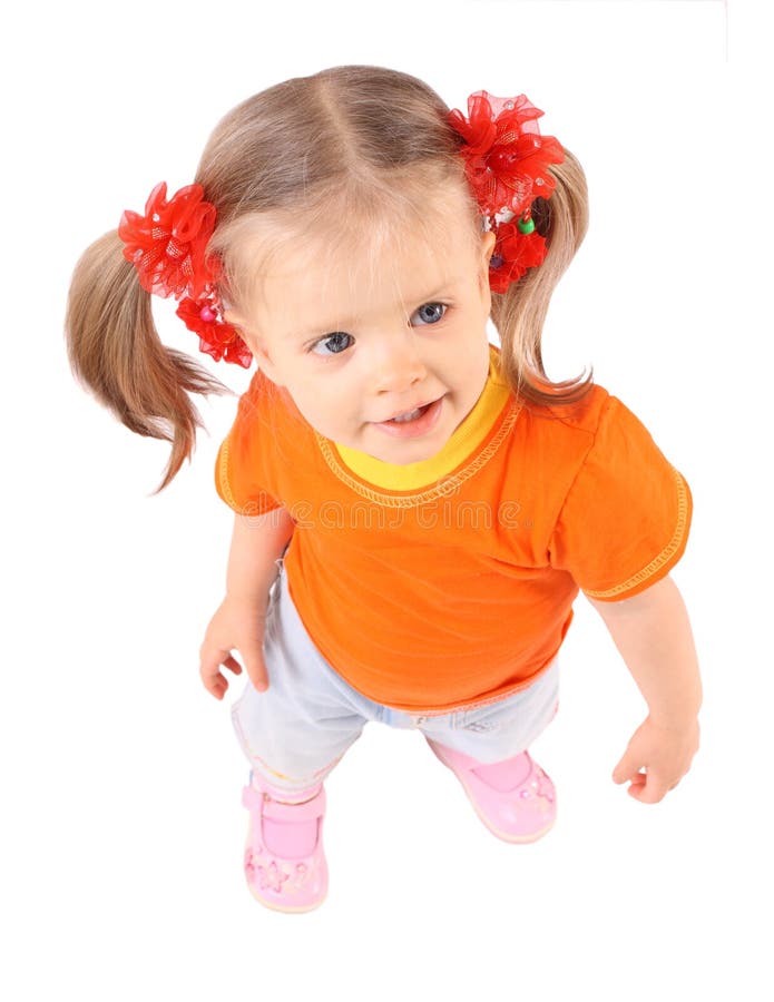 Cute baby in blue jeans, white t-shirt and denim baseball cap sits isolated  on white background Stock Photo