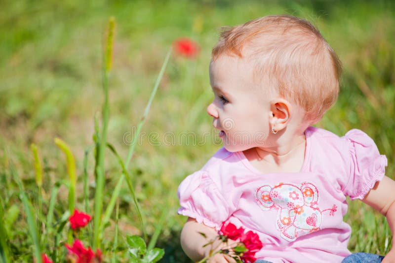 Baby girl outdoor stock photo