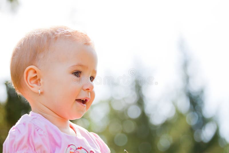 Baby girl outdoor stock photos
