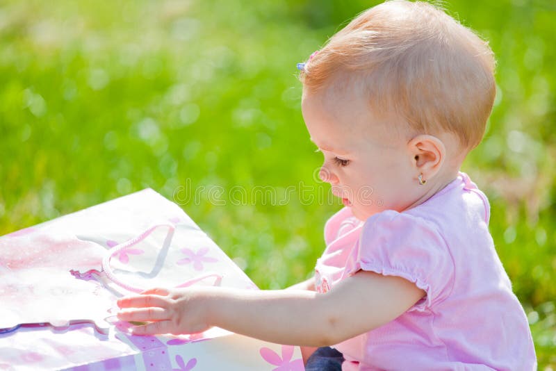 Baby girl outdoor stock photography