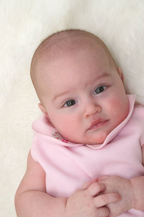 Baby Girl in Pink 01 stock image. Image of infant, female 64437
