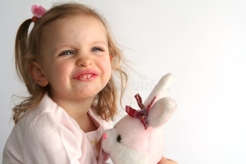 Baby girl and pink bunny stock image. Image of child, bunny 2112187