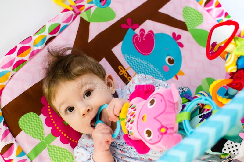 Baby Girl Playing in an Activity Gym Stock Image Image of active