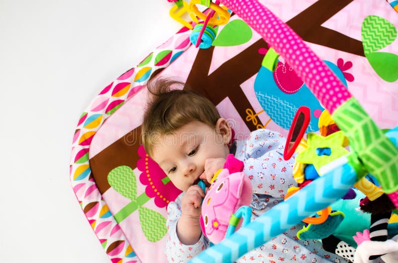 Baby Girl Playing in an Activity Gym Stock Image Image of childhood