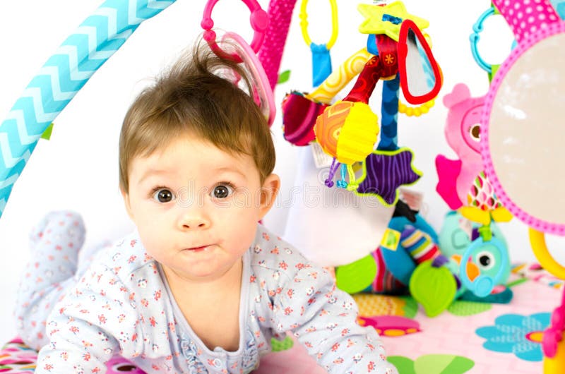 Baby Girl Playing in an Activity Gym Stock Photo Image of playing