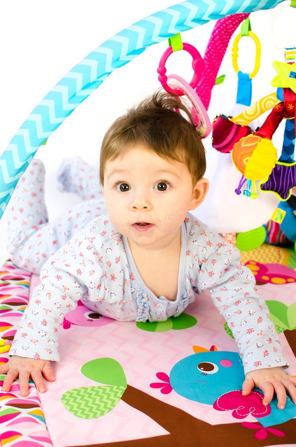 Baby Girl Playing in an Activity Gym Stock Photo Image of