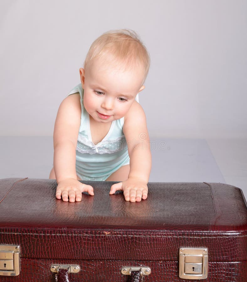 Little Girl Heavy Suitcase Stock Photos Free & RoyaltyFree Stock