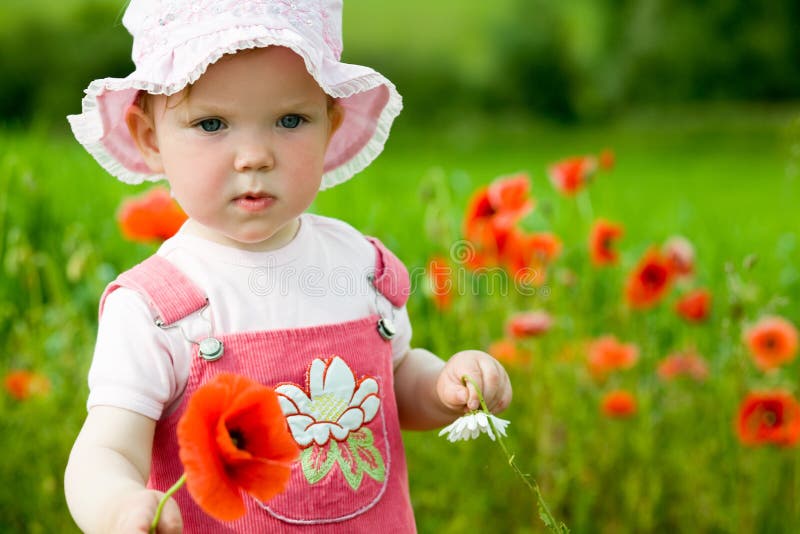 Baby-girl with red flower