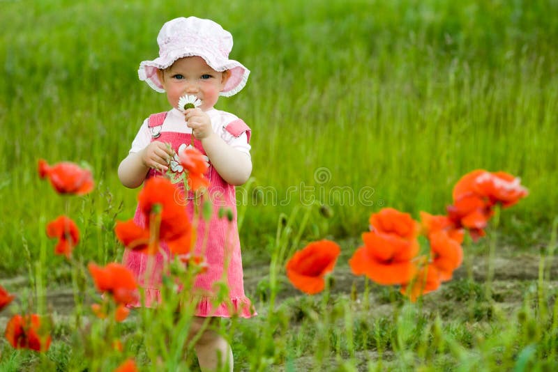 Baby-girl with red flower