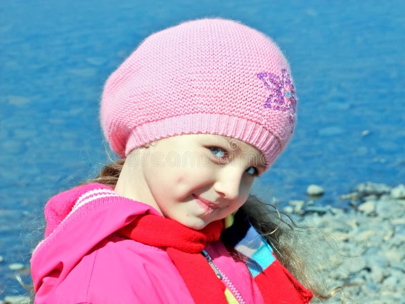 Baby girl by the river stock photo. Image of autumn, beach 26746858