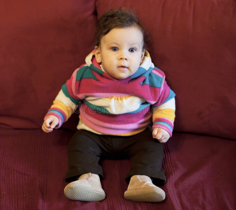 Baby girl sitting stock photos Baby girl sitting stock photos