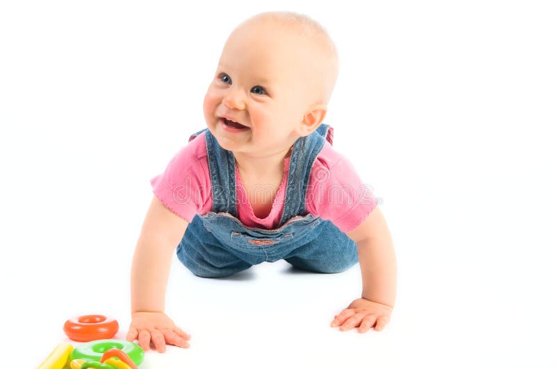 Baby girl smiling and crawling