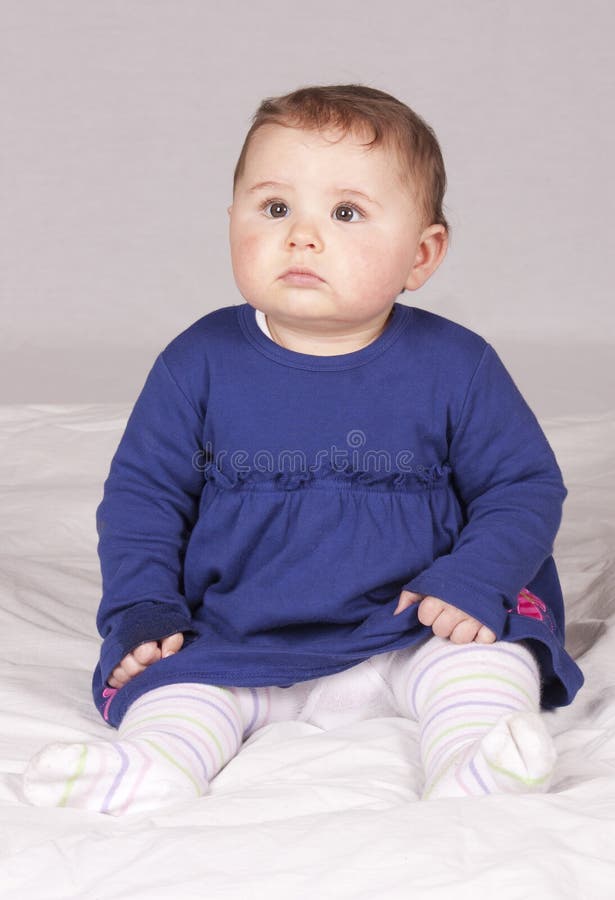 Baby Girl stock image. Image of purple, dress, wearing 45357857