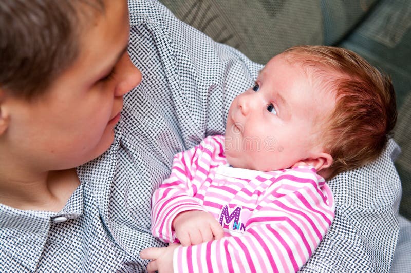 Baby girl with teenage brother royalty free stock photos Baby girl with teenage brother royalty free stock photos